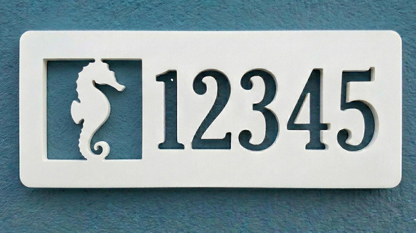 Rectangular PVC white house number sign with '12345' and a seahorse design on a blue background