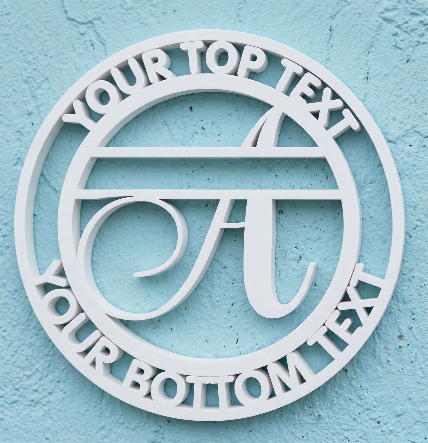 Decorative white PVC wall art with the letter "A" and customizable text on a light blue background