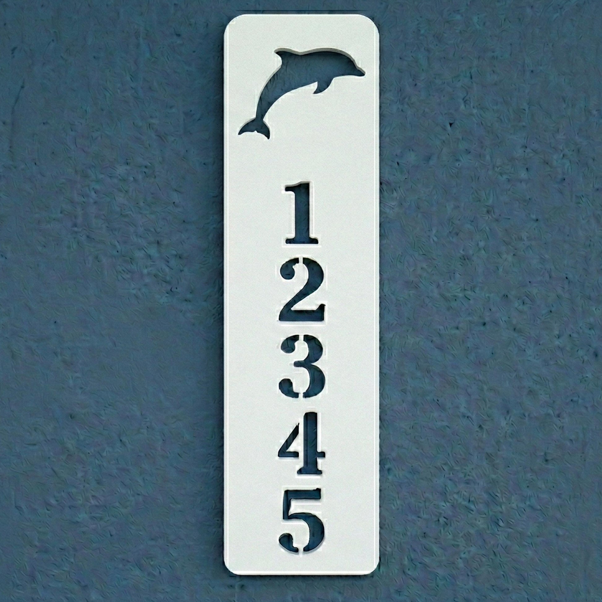 Decorative house number sign with a dolphin design on a blue background