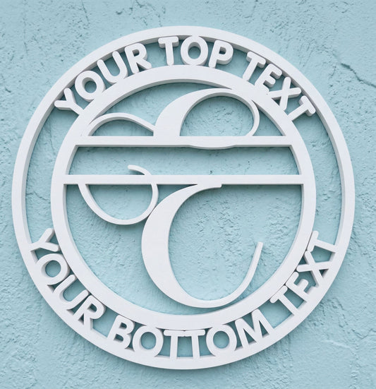 Decorative white PVC wall art with the letter "E" and customizable text on a light blue background