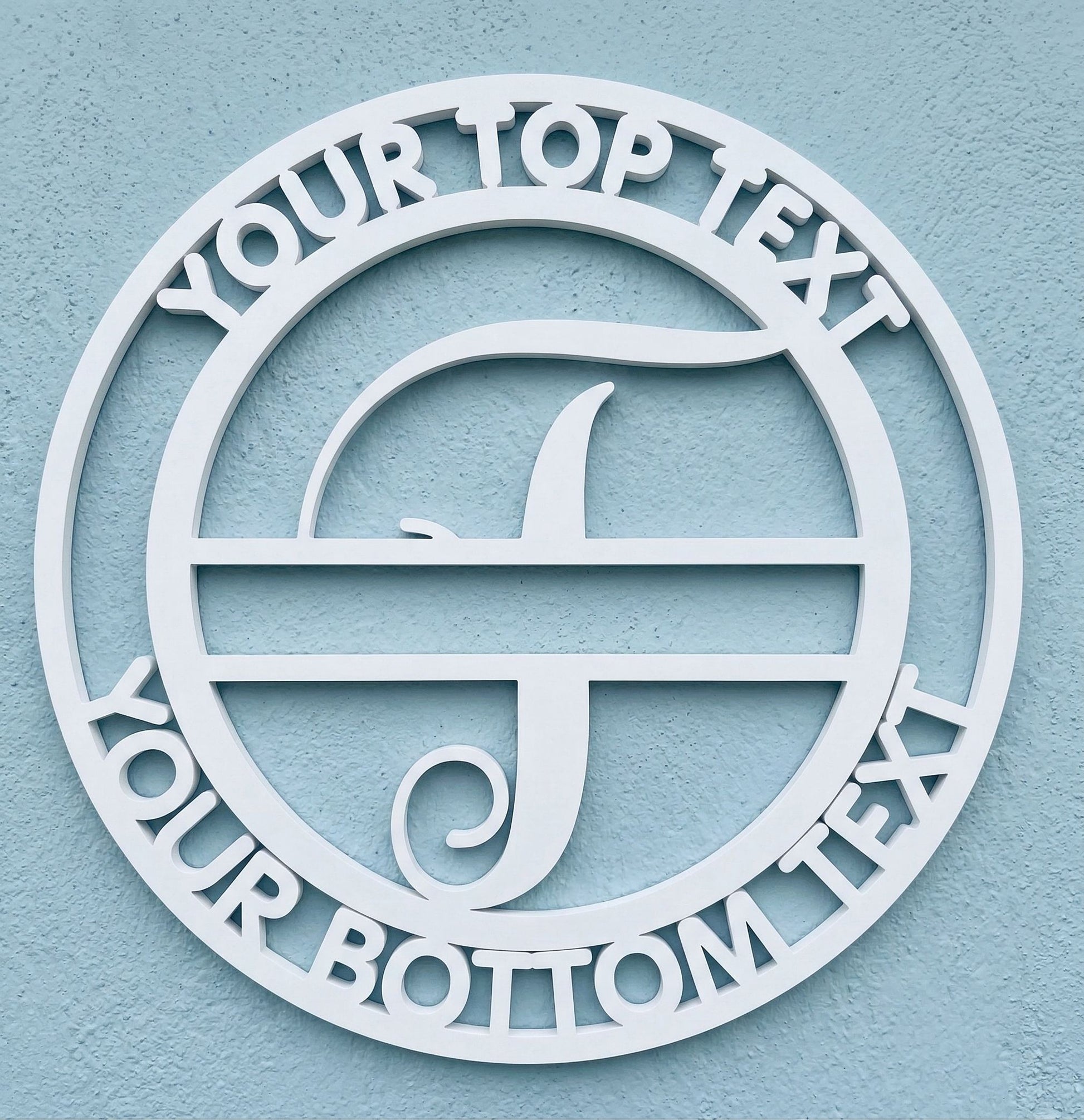 Decorative white PVC wall art with the letter "F" and customizable text on a light blue background