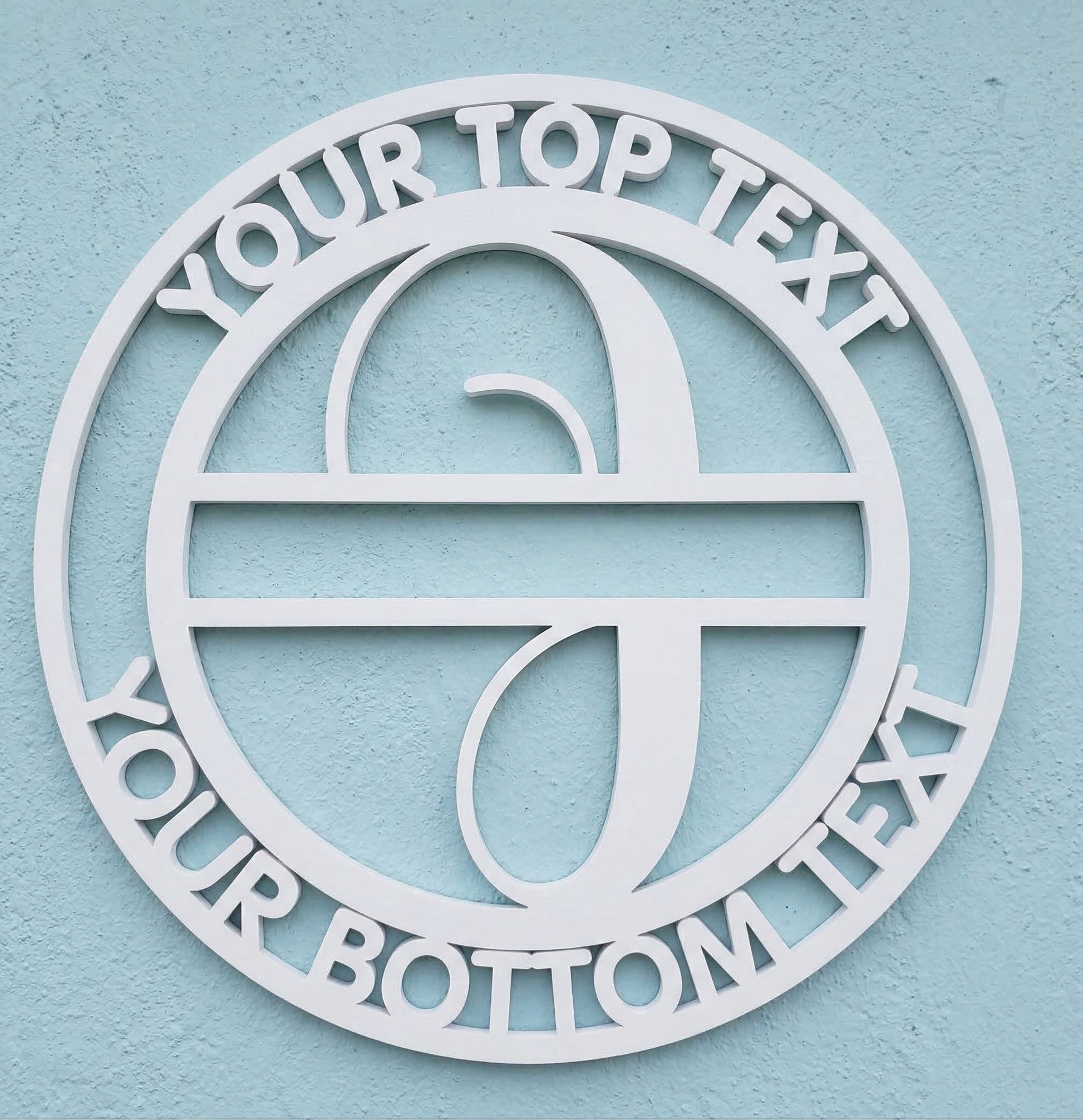 Decorative white PVC wall art with the letter "I" and customizable text on a light blue background