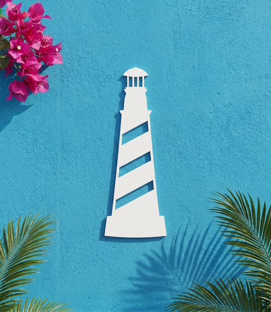 White PVC lighthouse wall / shutter accent art on a blue wall with plants around