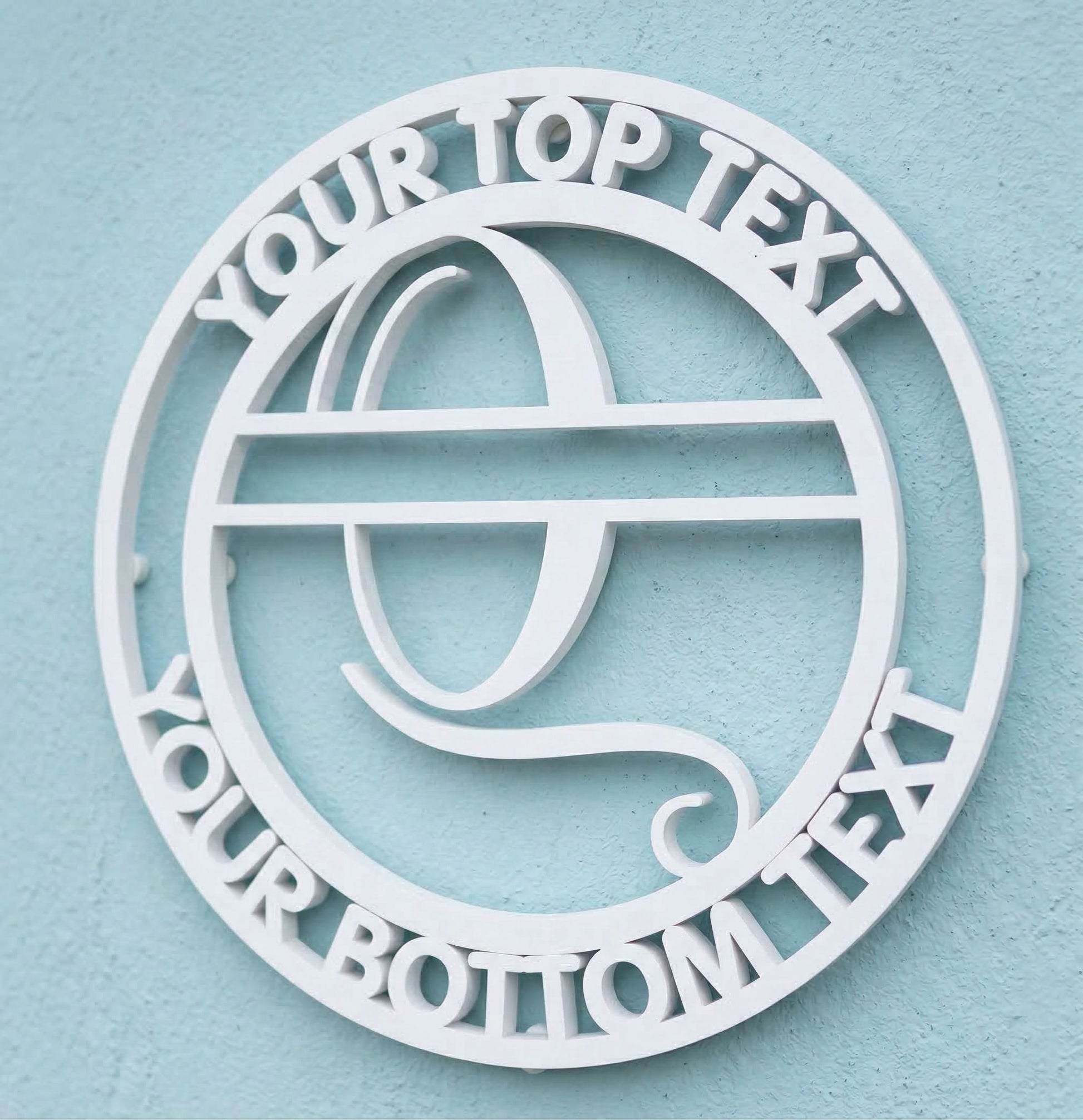 Decorative white PVC wall art with the letter "Q" and customizable text on a light blue background