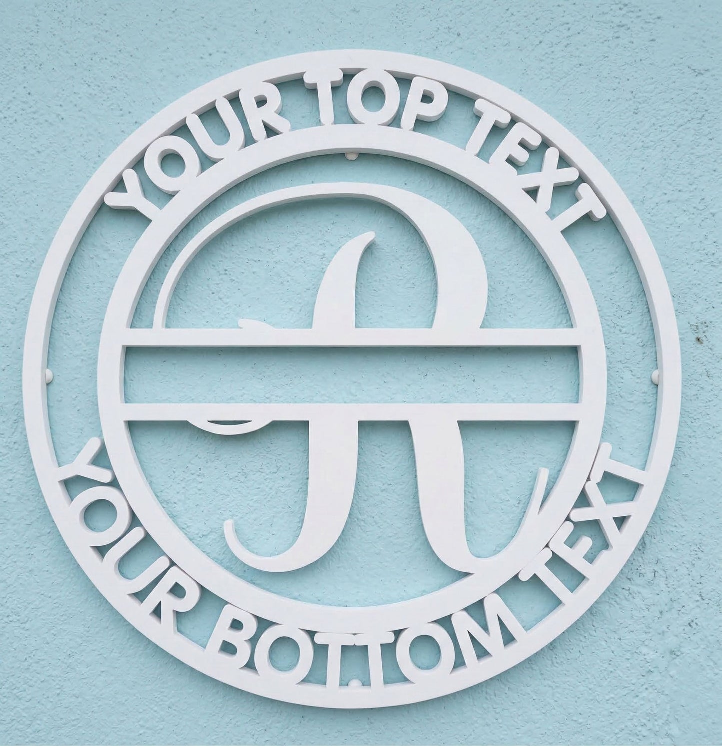 Decorative white PVC wall art with the letter "R" and customizable text on a light blue background