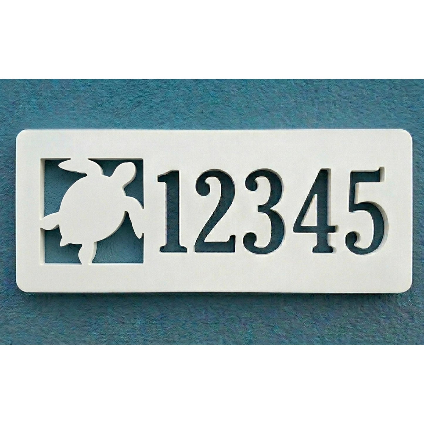 Rectangular PVC white house number sign with '12345' and a sea turtle design on a blue background