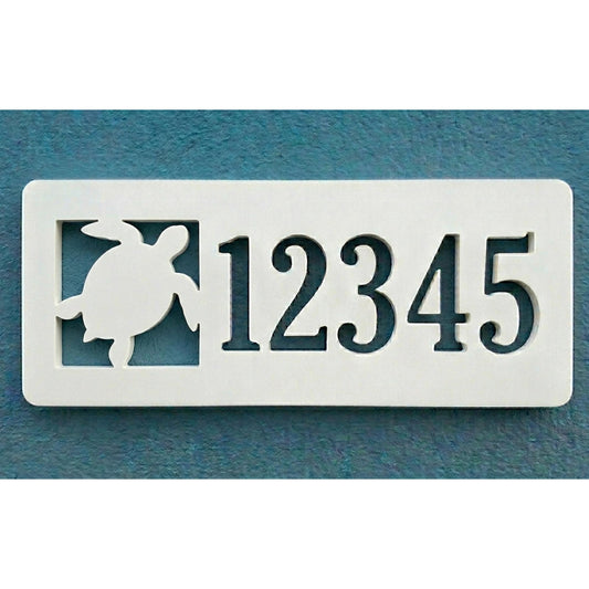 Rectangular PVC white house number sign with '12345' and a sea turtle design on a blue background