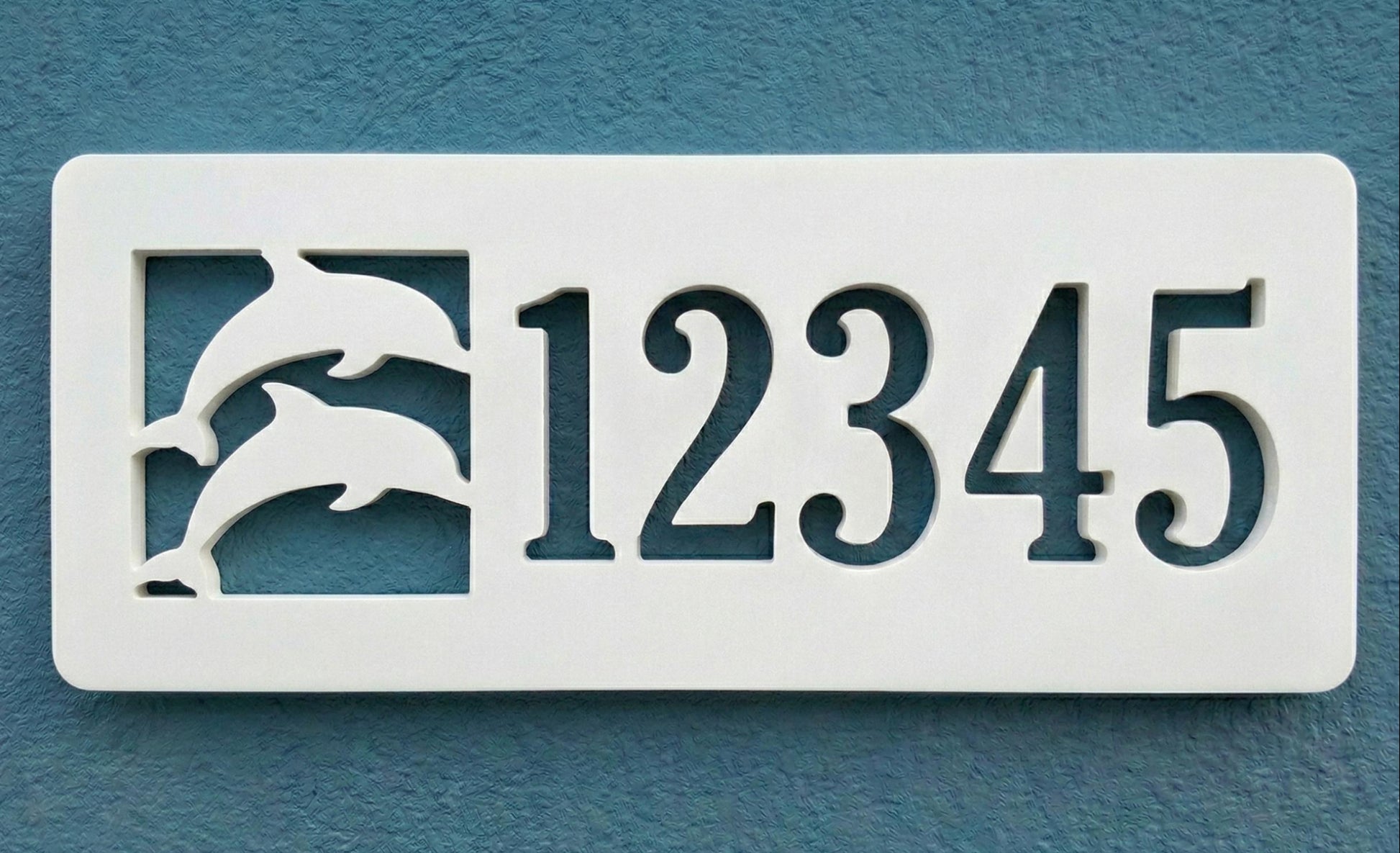 Decorative white PVC house number sign with 2 dolphins on a blue background