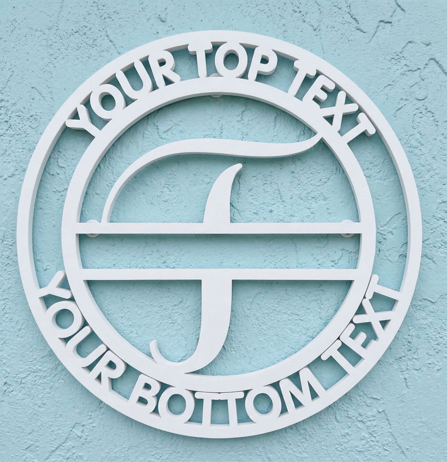 Decorative white PVC wall art with the letter "T" and customizable text on a light blue background