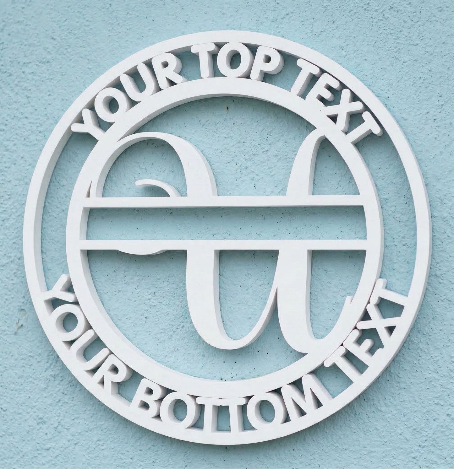 Decorative white PVC wall art with the letter "U" and customizable text on a light blue background