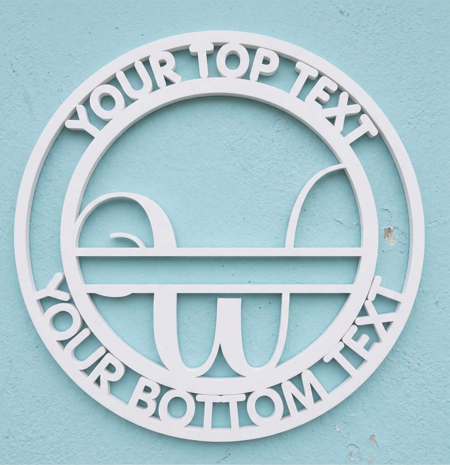 Decorative white PVC wall art with the letter "W" and customizable text on a light blue background